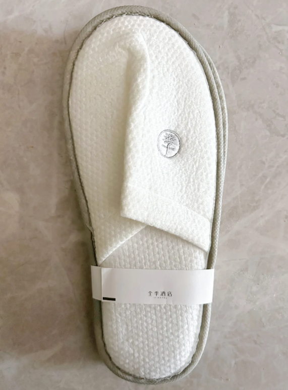 are hotel slippers free to take